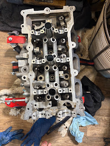 Cylinder head and engine repair work